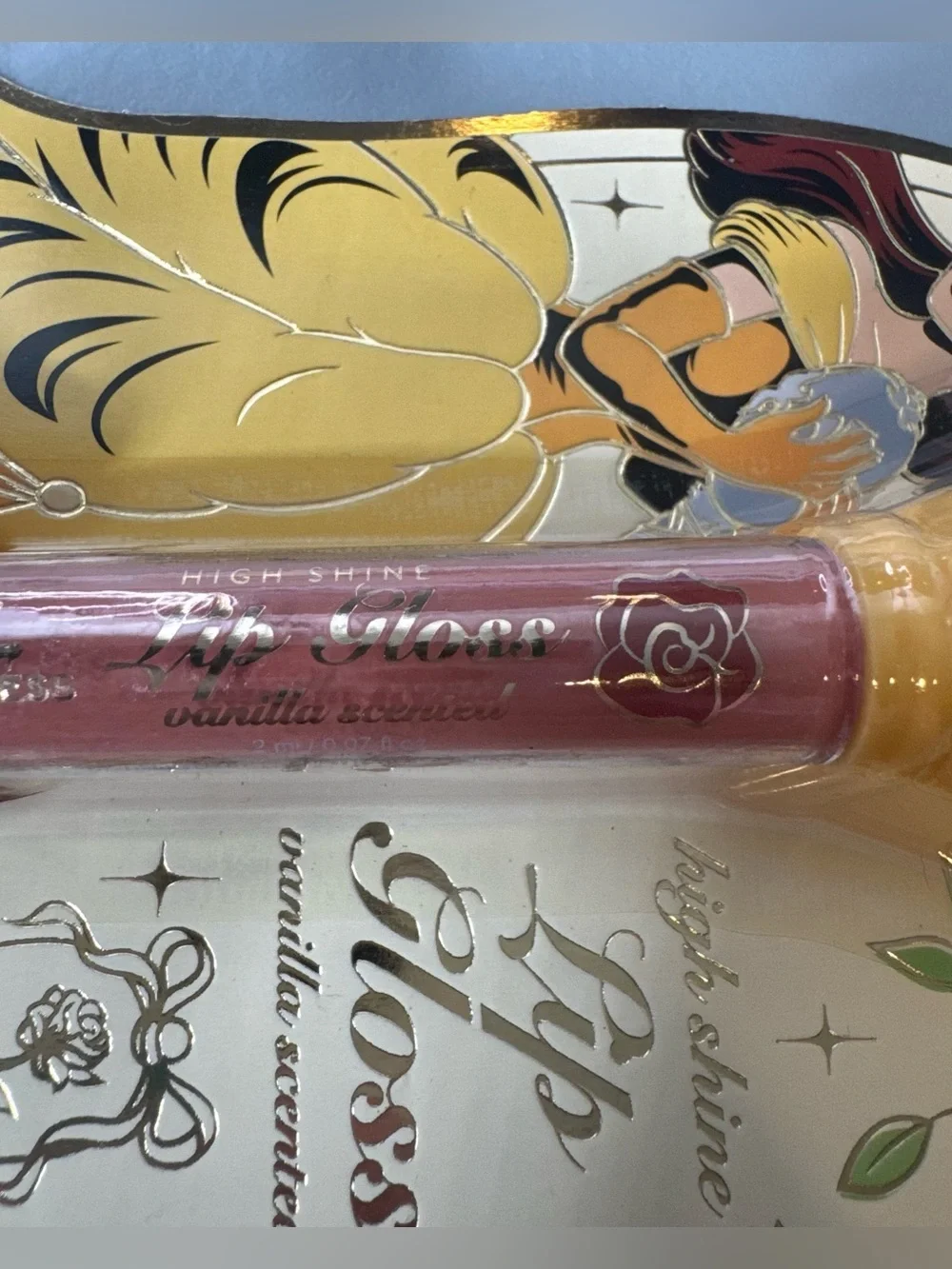 Disney princess Belle Lip Gloss vanilla scented Pink mauve Shade high shine clas